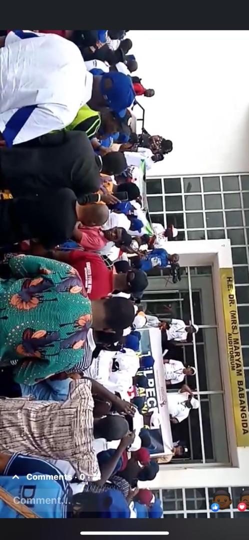 Dr. Emmanuel awarding scholarships to students